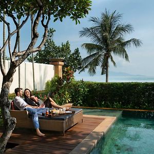 Luxe Suite met een King Size Bed en Uitzicht op het Strand